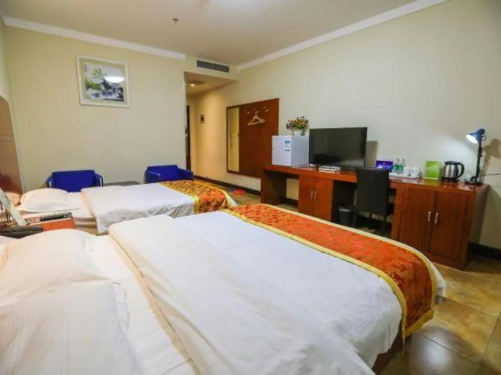 Bed in Beijing Wanjia Traders Hotel