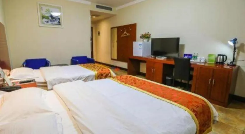 Bed in Beijing Wanjia Traders Hotel