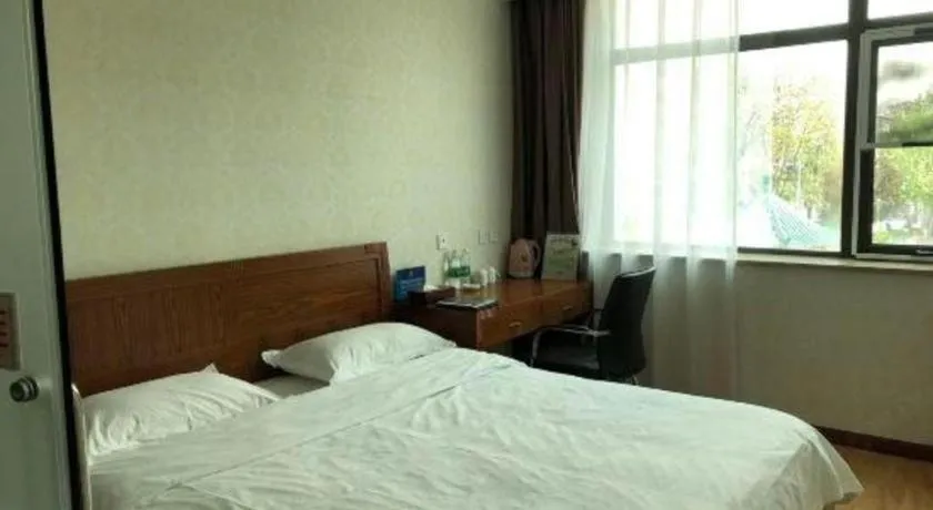 Bed in Beijing Wanjia Traders Hotel