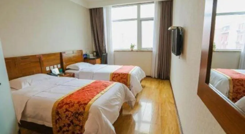 Bed in Beijing Wanjia Traders Hotel