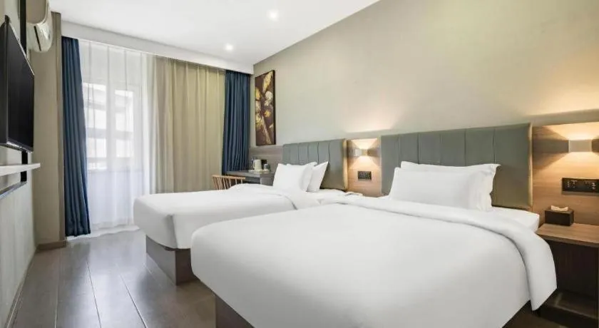 Bed in 7 Days Inn Tianjin Railway Station