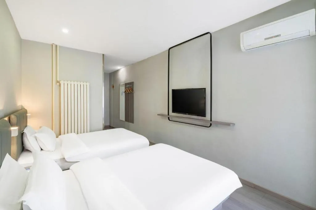 Bed in 7 Days Inn Tianjin Railway Station