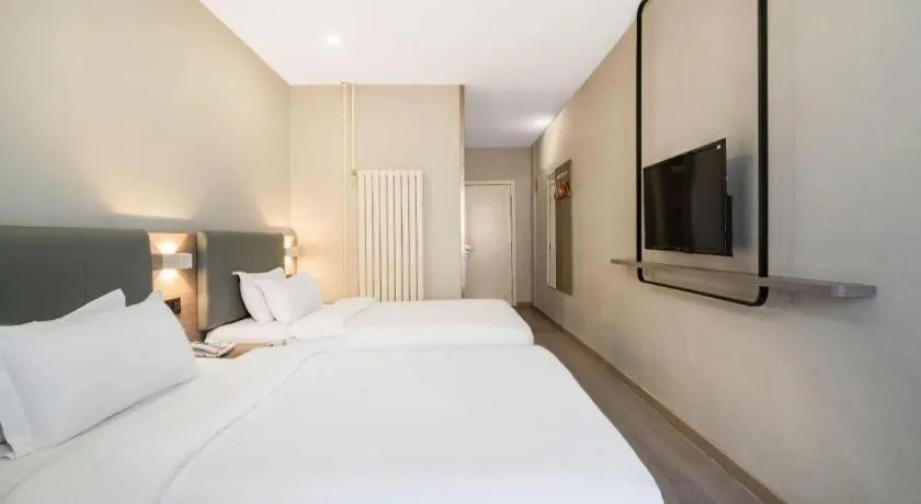 Bed in 7 Days Inn Tianjin Railway Station