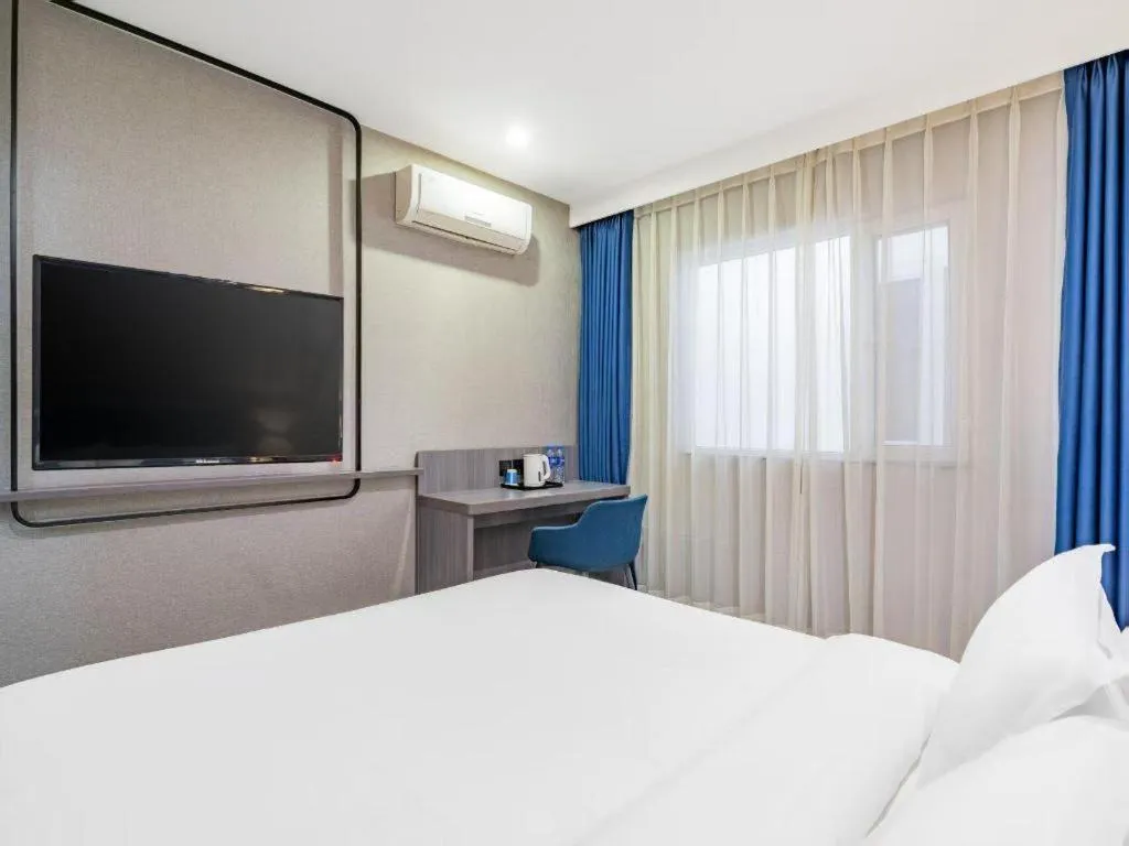 Bed in 7 Days Inn Tianjin Railway Station