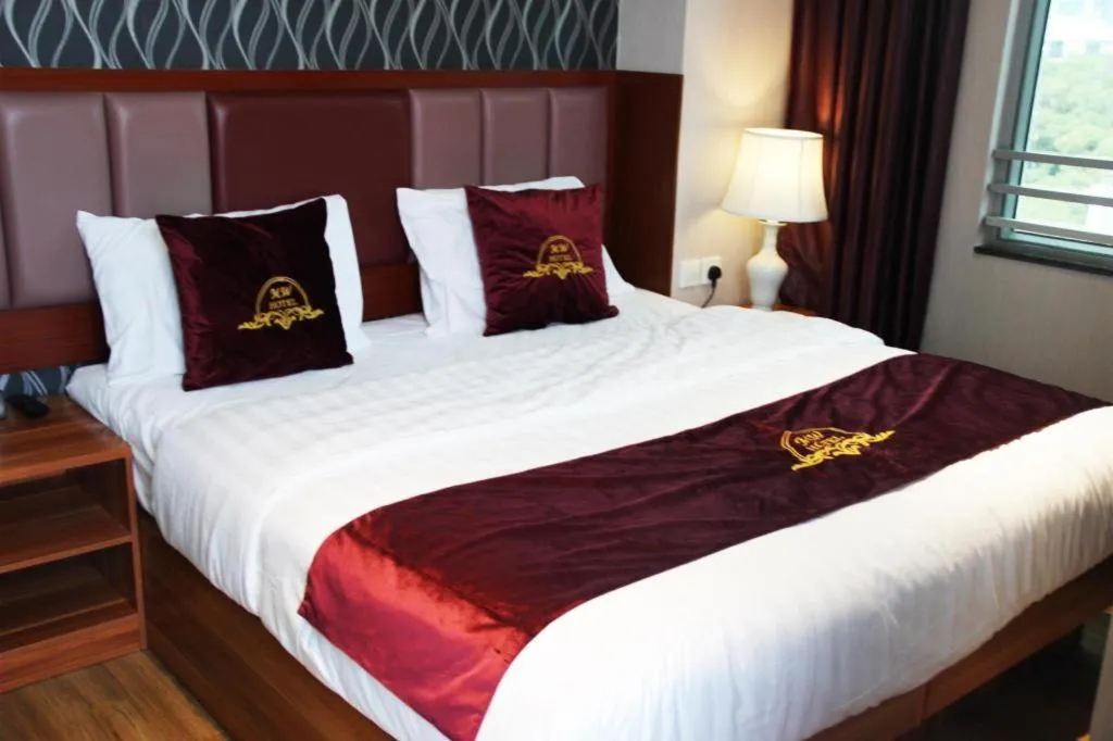 Bed in Metro Winner Hotel