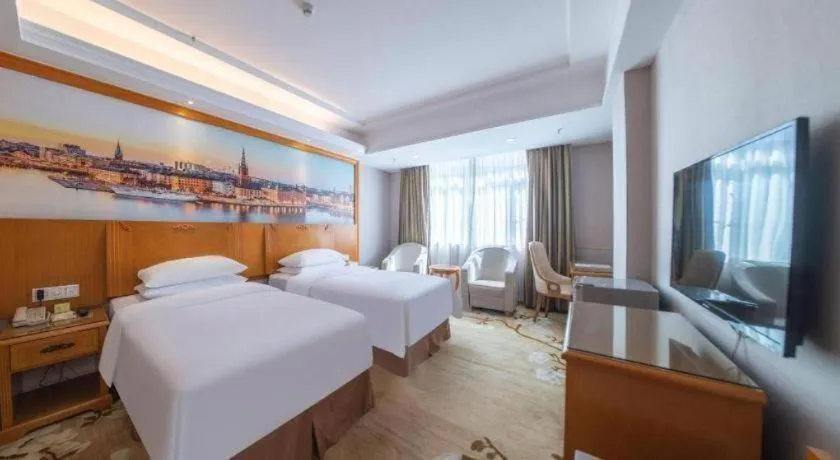 Bed in Vienna Hotel Guangzhou Luochongwei Bus Station Branch