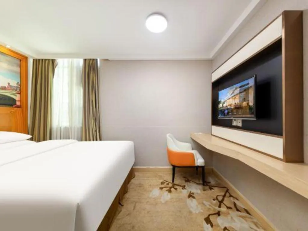 Bed in Vienna Hotel Guangzhou Luochongwei Bus Station Branch