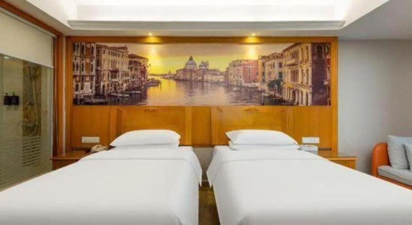 Bed in Vienna Hotel Guangzhou Luochongwei Bus Station Branch