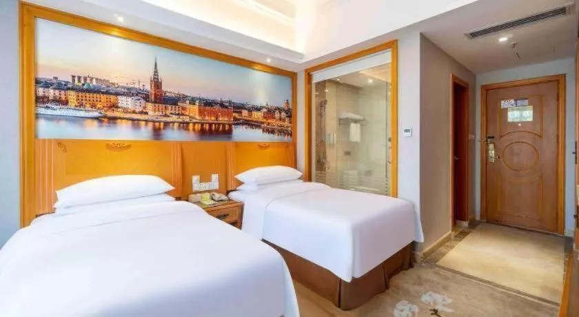 Bed in Vienna Hotel Guangzhou Luochongwei Bus Station Branch