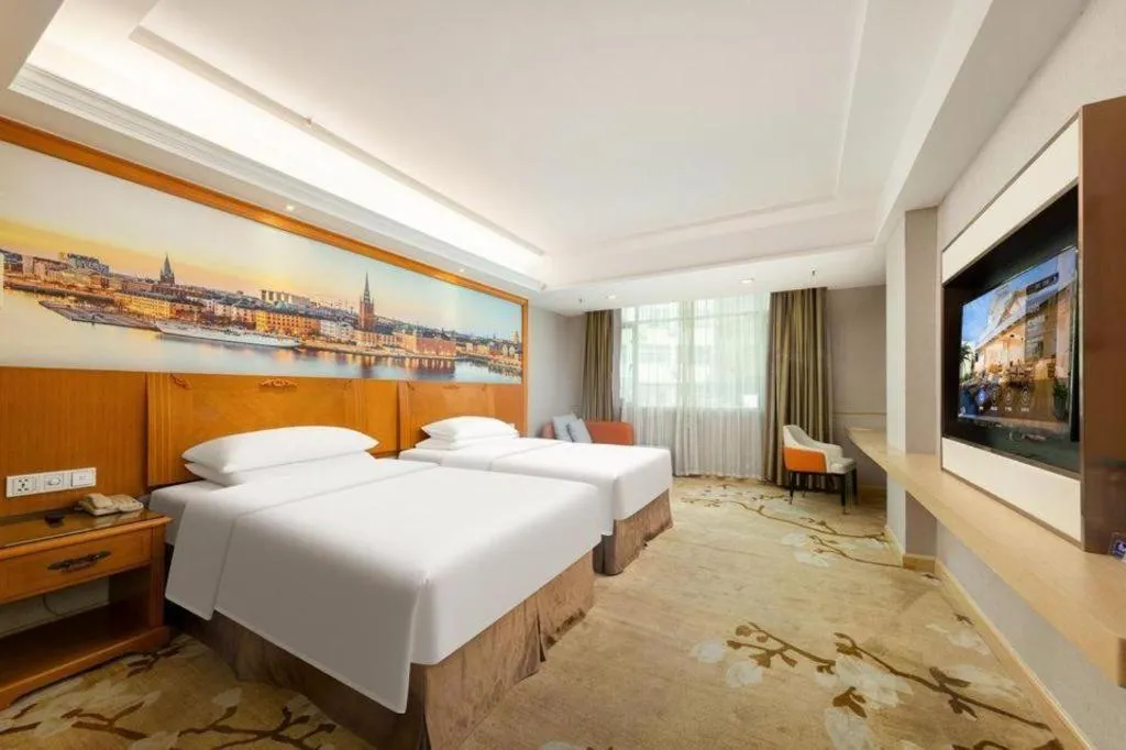 Bed in Vienna Hotel Guangzhou Luochongwei Bus Station Branch