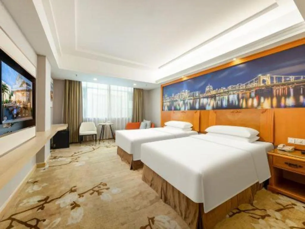 Bed in Vienna Hotel Guangzhou Luochongwei Bus Station Branch