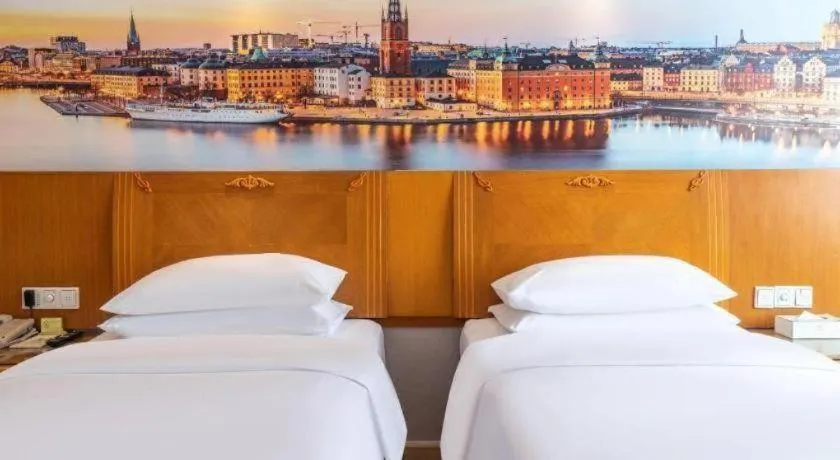 Bed in Vienna Hotel Guangzhou Luochongwei Bus Station Branch