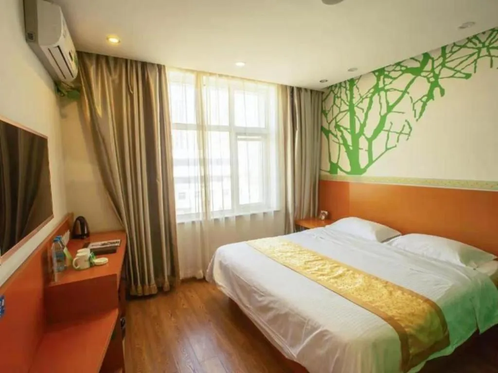 Bed in Vatica Tianjin Jinghai Bus Station Home World Plaza Hotel