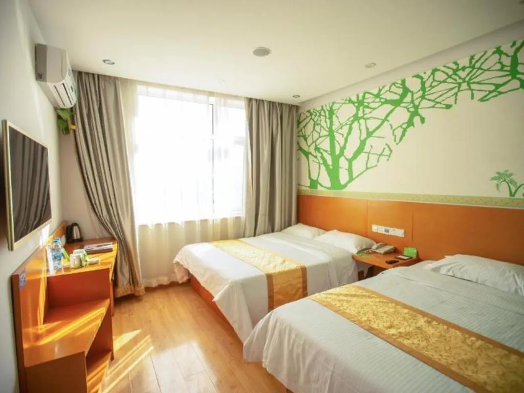 Bed in Vatica Tianjin Jinghai Bus Station Home World Plaza Hotel