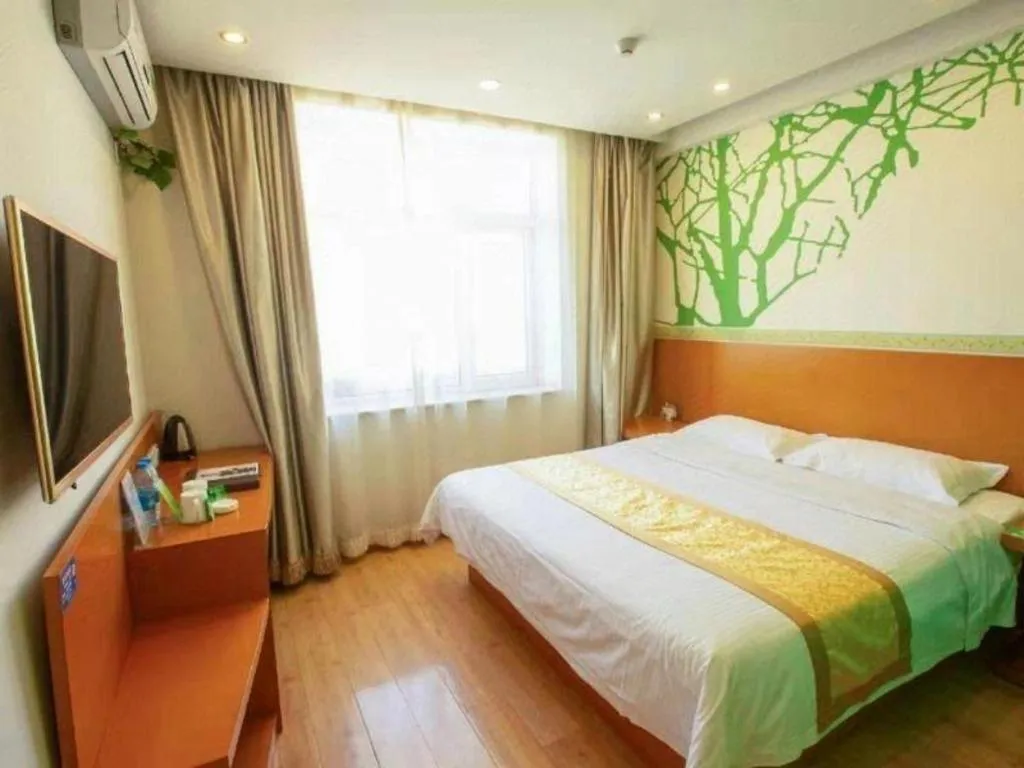 Bed in Vatica Tianjin Jinghai Bus Station Home World Plaza Hotel