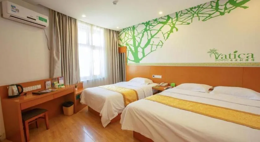 Bed in Vatica Tianjin Jinghai Bus Station Home World Plaza Hotel