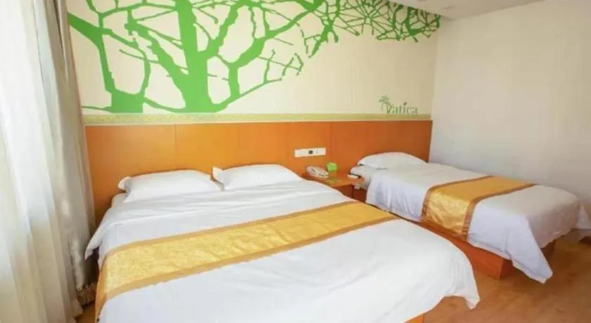 Bed in Vatica Tianjin Jinghai Bus Station Home World Plaza Hotel