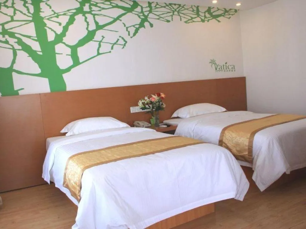 Bed in Vatica Tianjin Jinghai Bus Station Home World Plaza Hotel