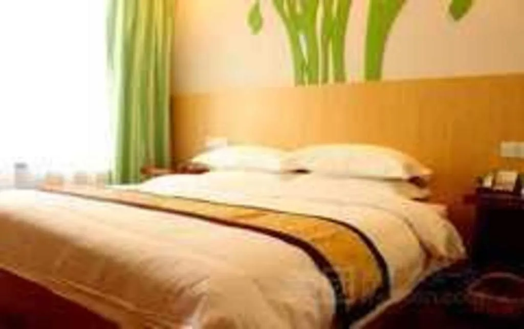 Bed in Vatica Tianjin Jinghai Bus Station Home World Plaza Hotel