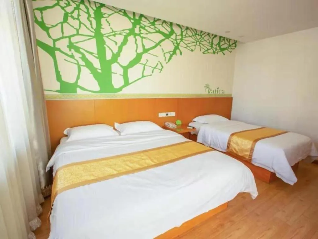 Bed in Vatica Tianjin Jinghai Bus Station Home World Plaza Hotel