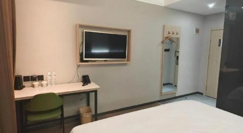 Bed in Vatica Tianjin Jinghai Bus Station Home World Plaza Hotel