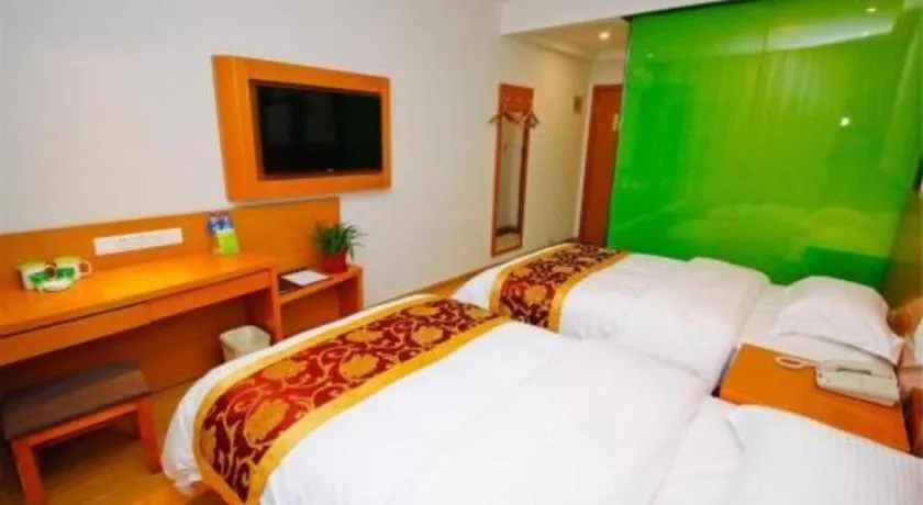 Bed in Vatica Tianjin Jinghai Bus Station Home World Plaza Hotel