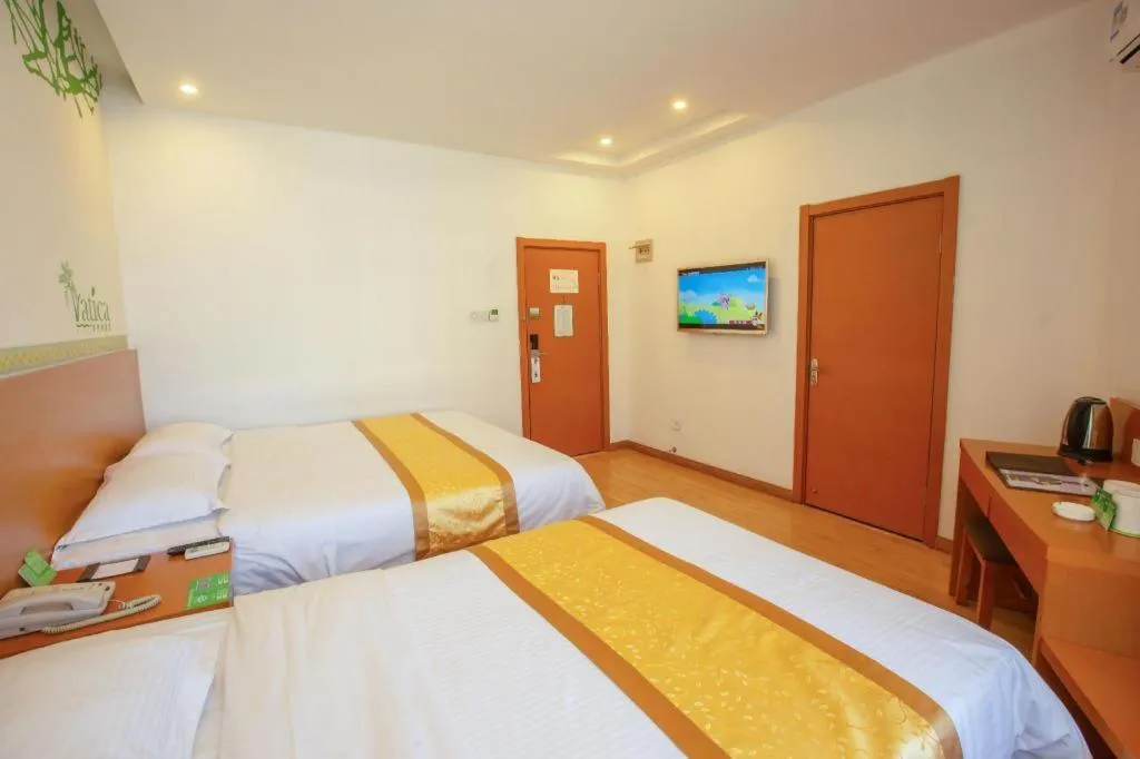 Bed in Vatica Tianjin Jinghai Bus Station Home World Plaza Hotel