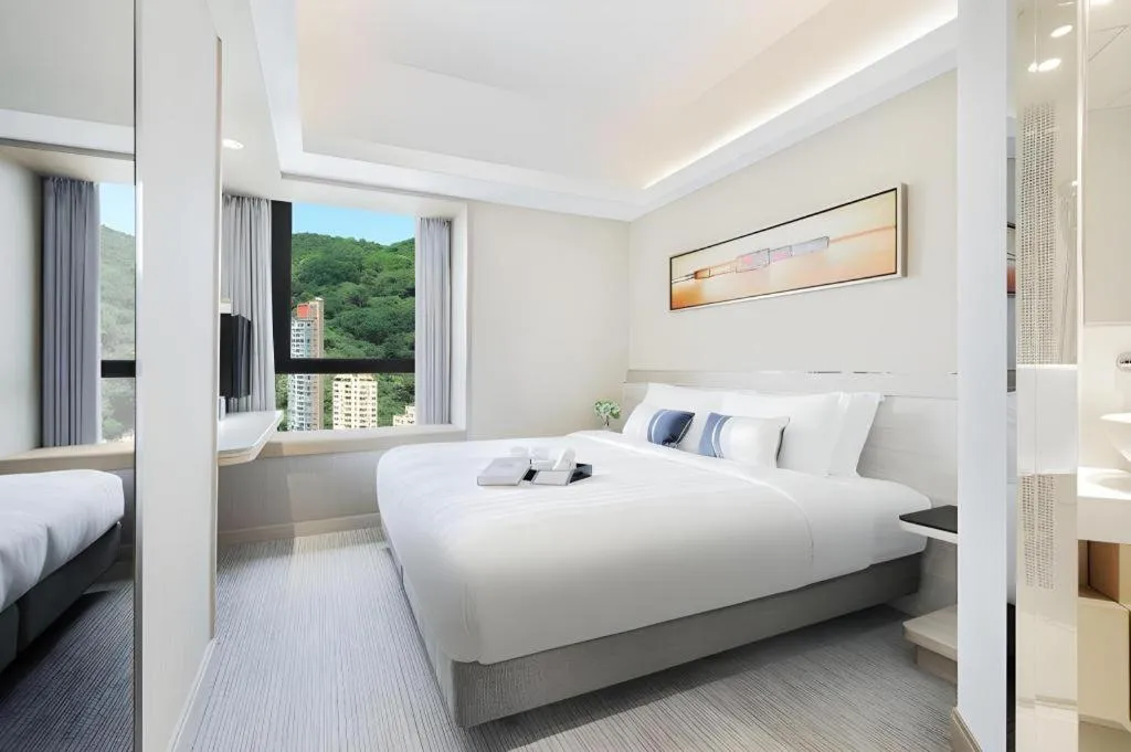 Bed in Elysion Place Hotel Causeway Bay
