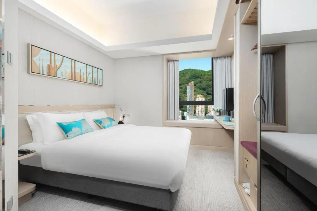Bed in Elysion Place Hotel Causeway Bay