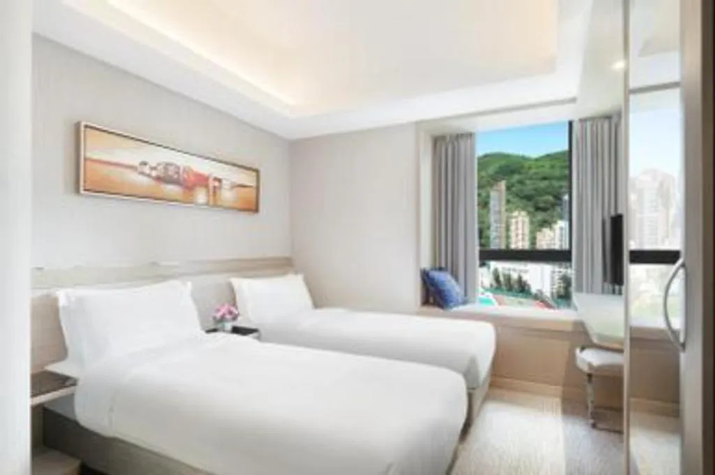 Bed in Elysion Place Hotel Causeway Bay