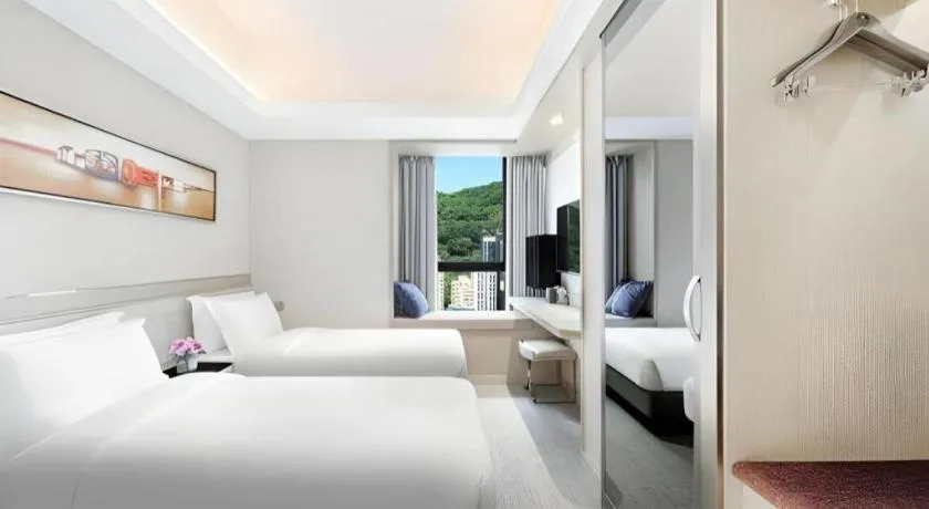 Bed in Elysion Place Hotel Causeway Bay