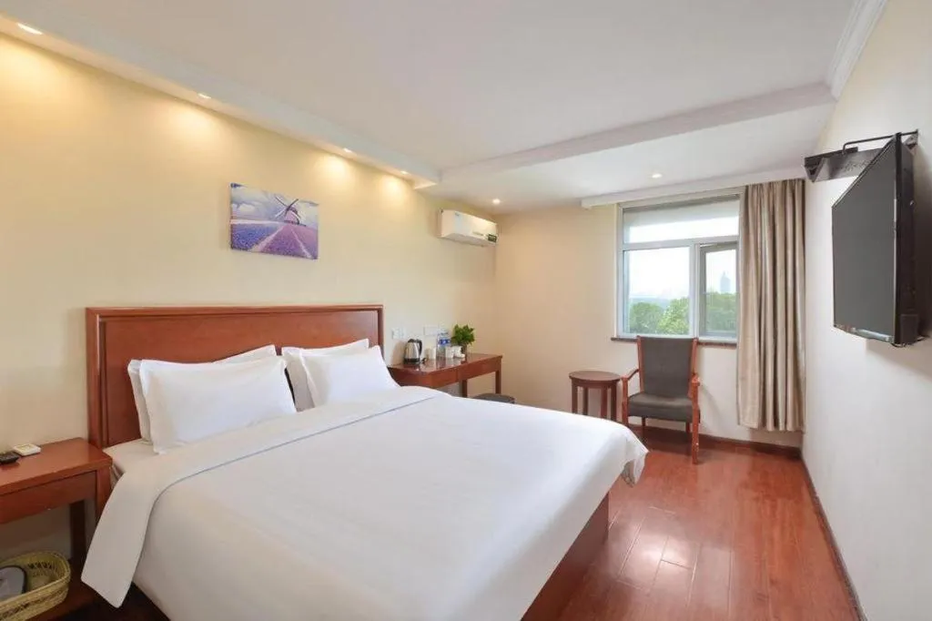 Bed in GreenTree Inn Nanjing Forestry University National Exhibition Center Express Hotel