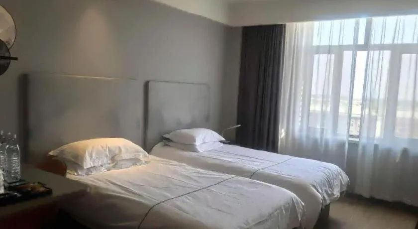 Bed in Jinjiang Inn Baotou Salaqi Railway Station