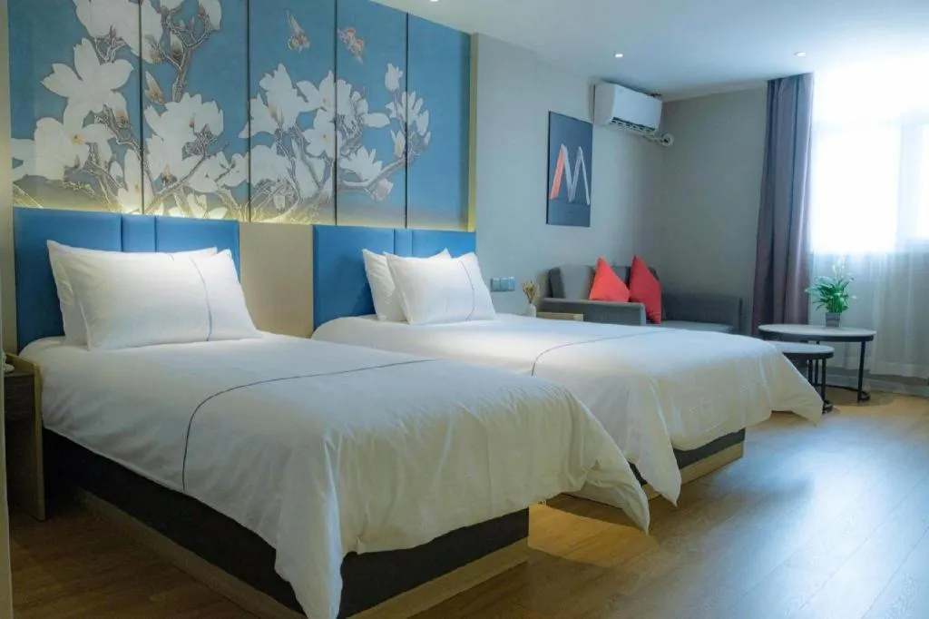 Bed in Magnotel Business Xuzhou Feng County Bus Station