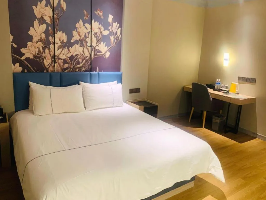 Bed in Magnotel Business Xuzhou Feng County Bus Station