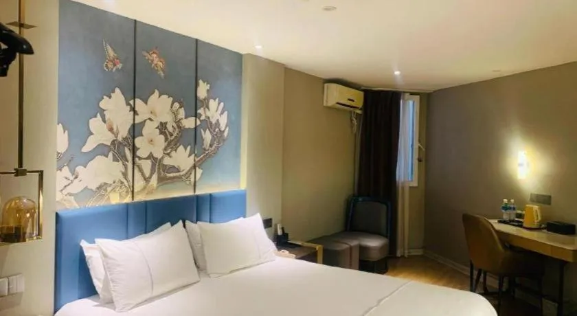 Bed in Magnotel Business Xuzhou Feng County Bus Station