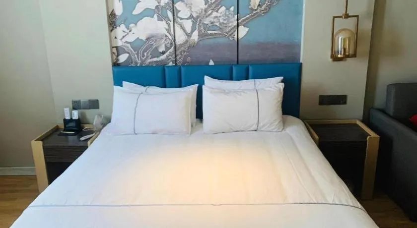 Bed in Magnotel Business Xuzhou Feng County Bus Station