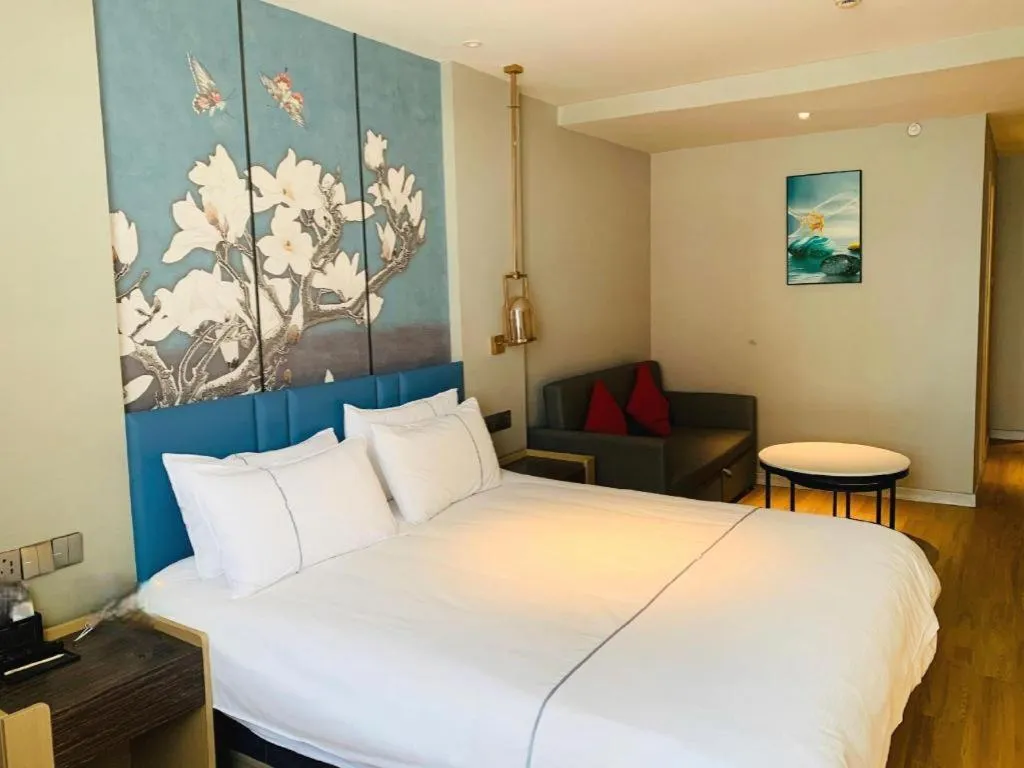 Bed in Magnotel Business Xuzhou Feng County Bus Station