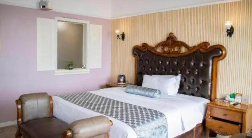 Bed in Guangzhou Impression Hotel