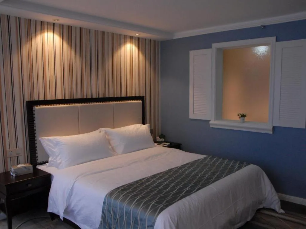 Bed in Guangzhou Impression Hotel