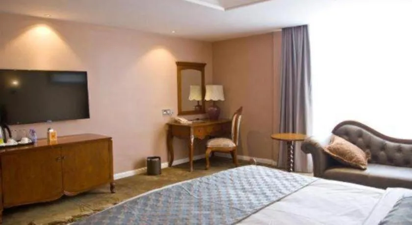 Bed in Guangzhou Impression Hotel