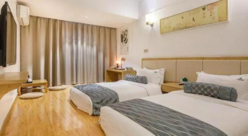 Bed in Guangzhou Impression Hotel