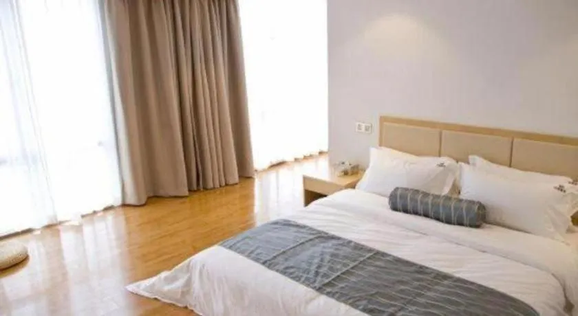 Bed in Guangzhou Impression Hotel