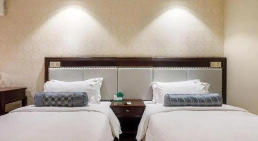 Bed in Guangzhou Impression Hotel