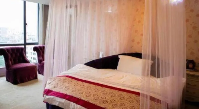 Bed in Guangzhou Impression Hotel