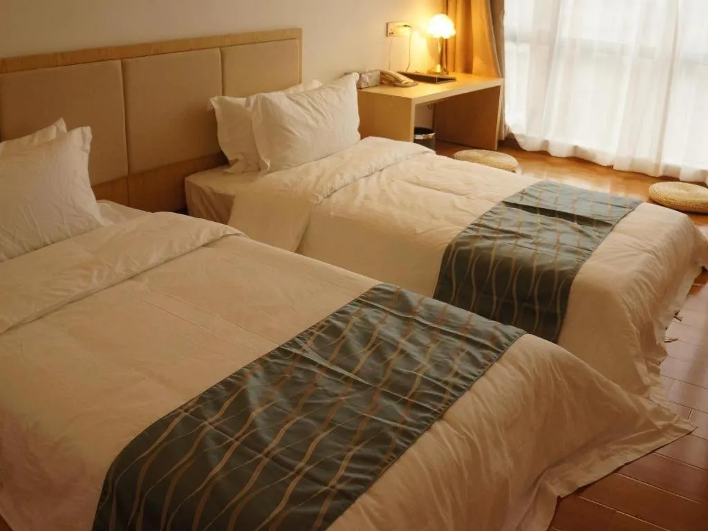 Bed in Guangzhou Impression Hotel