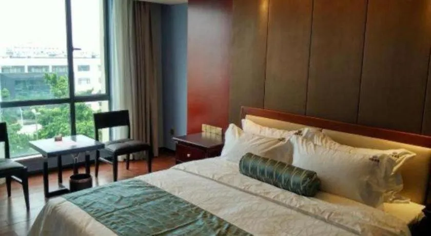 Bed in Guangzhou Impression Hotel