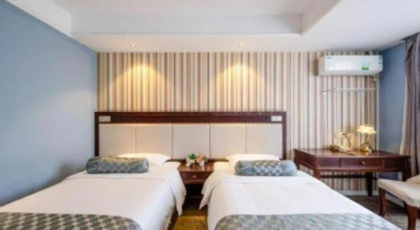 Bed in Guangzhou Impression Hotel