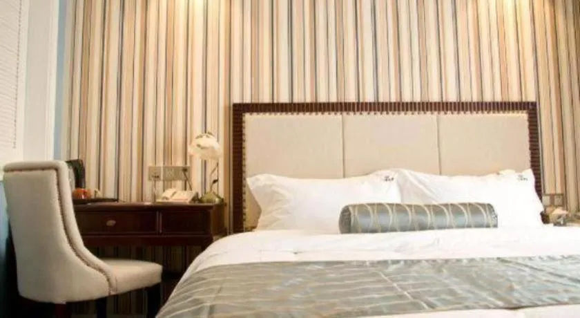 Bed in Guangzhou Impression Hotel