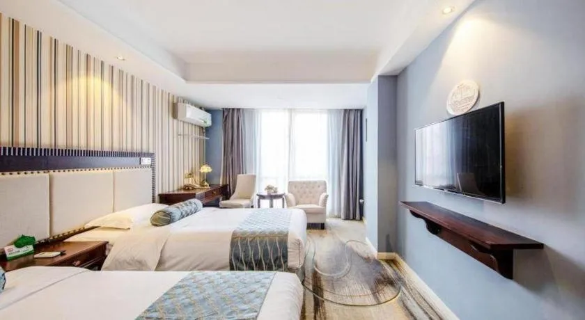 Bed in Guangzhou Impression Hotel